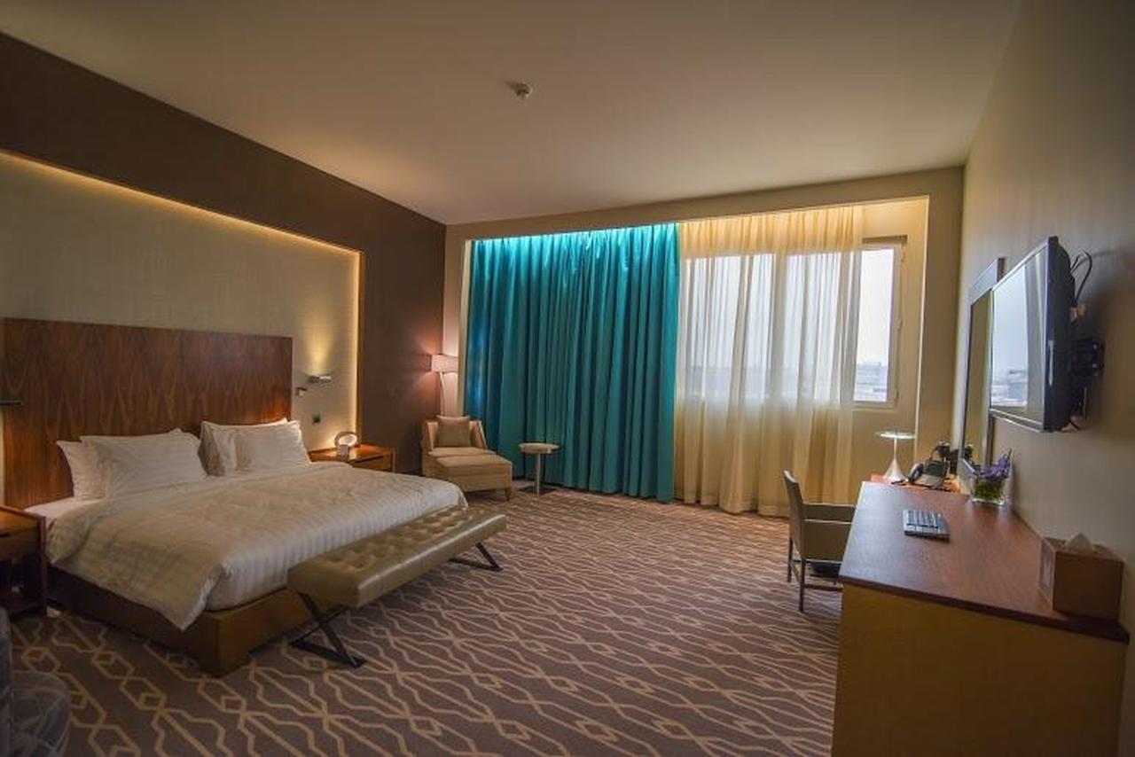 Millennium Hail Hotel Екстериор снимка A room at the hotel