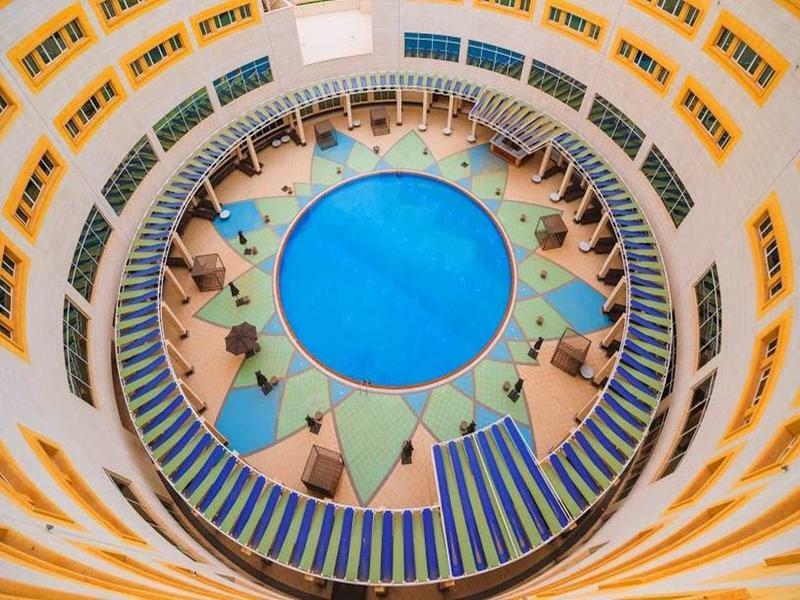 Millennium Hail Hotel Екстериор снимка The atrium of the school